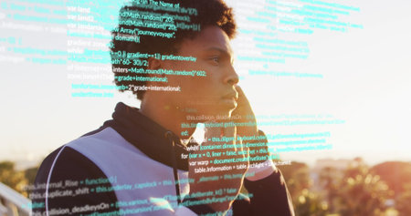 Image of financial data processing over biracial man using earphones during exercise. Global sports, connections, computing and data processing concept digitally generated image.の写真素材