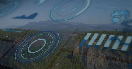 Image of scope scanning and statistic charts over forest and mountains. Nature, global finance, statistics, computing and data processing concept digitally generated image.の写真素材