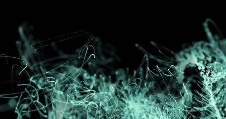 Image of green light trails moving on seamless loop. Colour, shape, movement and repetition concept...