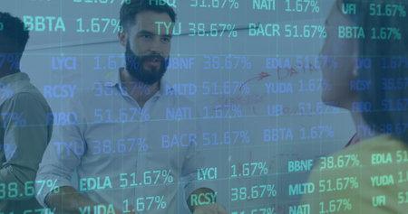 Image of trading board over diverse manager explaining strategy to coworkers on whiteboard. Digital...