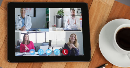 Image of digital interface with icons on digital tablet screen with people talking on video call....