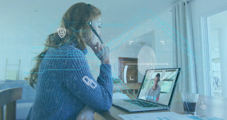 Image of biometric fingerprint over businesswoman using phone headset and laptop. global online...