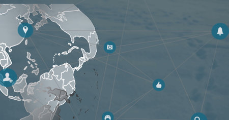 Image of network of digital icons over spinning globe against blue background. Global networking and business technology conceptの写真素材