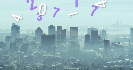 Image of multiple changing numbers floating against aerial view of cityscape. Computer interface and business technology conceptの写真素材