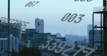Image of numbers and data processing over cityscape. Global business, finances, computing and data processing concept digitally generated image.の写真素材