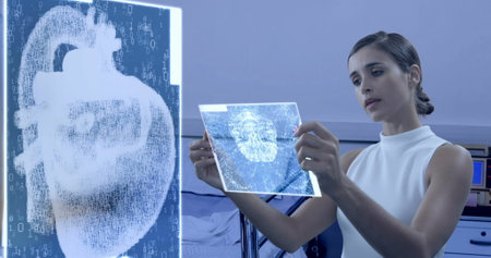 Image of caucasian female doctor with xray in hospital. medical and healthcare services digitally generated image.の写真素材