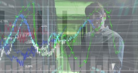 Image of financial data processing over asian businessman in server room. global business, finances and digital interface concept digitally generated image.の写真素材