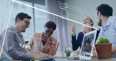 Image of financial data processing over diverse business people working in office. Global business,...