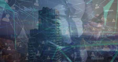 Image of network of profile icons over mid section of a man using smartphone against cityscape. Global networking and business technology conceptの写真素材