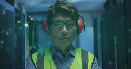 Image of molecular structures floating over asian male engineer standing at server room. Medical...