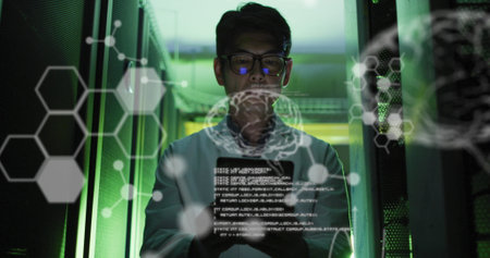 Image of medical data processing over asian male engineer using digital tablet at server room. Research science and business data storage technology conceptの写真素材