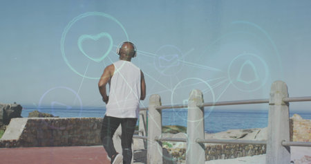 Image of network of connections over couple running outdoors. Global business deal digital interface technology and networking concept digitally generated image.の写真素材