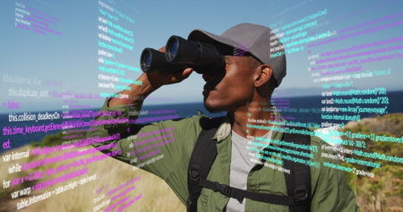 Image of data processing over african american man using binoculars in nature. Global travel, fitness, digital interface and data processing concept digitally generated image.の写真素材