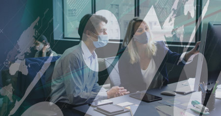 Image of statistical data processing over diverse man and woman discussing at office. Business data and covid-19 pandemic conceptの写真素材