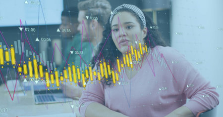 Image of statistical data processing against biracial woman talking to a colleague at office....