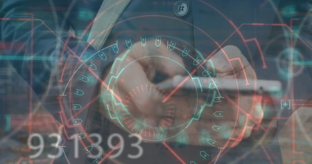 Asian male, middle-aged, examining complex digital graphics. Wearing formal shirt, focusing intently on futuristic data, he analyzes patternsの写真素材