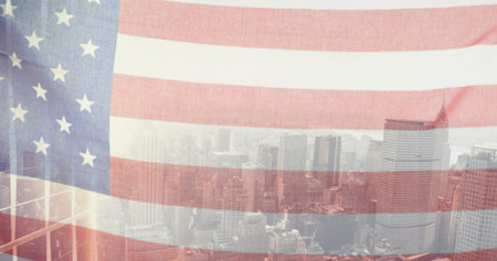 American flag overlaying city skyline, showing deep patriotism. Buildings bathing in soft light, offering serene blue backgroundの写真素材