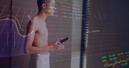 Image of trading boards over biracial man standing near window on making call using cellphone. Graphs, digital composite, report, business, stock market and technology concept.の写真素材