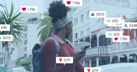 Image of social media data processing over african american woman using smartphone. Global social media, connections, computing and data processing concept digitally generated image.の写真素材