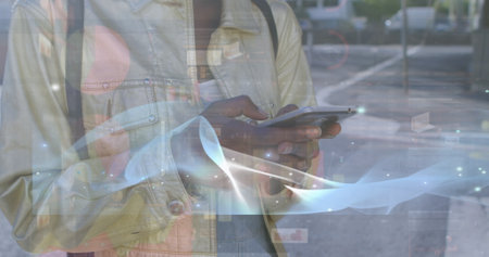 Image of data processing over african american woman using smartphone. Global technology, computing and digital interface concept digitally generated image.の写真素材