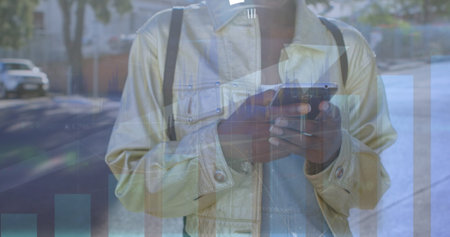 Image of data processing over african american womanman using smartphone. Global business, computing...