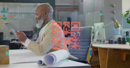 Image of qr code and data processing over african american businessman using tablet. Global cyber security, business, computing and data processing concept digitally generated image.の写真素材