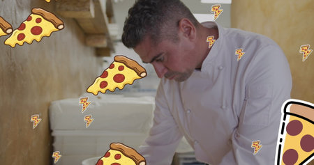 Image of pizza icons over biracial male chef making pizza. National pizza month and digital interface concept digitally generated image.の写真素材