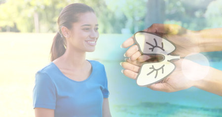Image of hands with lungs over biracial woman. Global medicine and world copd awareness day concept digitally generated image.の写真素材