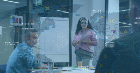 Image of world map and data processing against biracial woman giving a presentation at office....