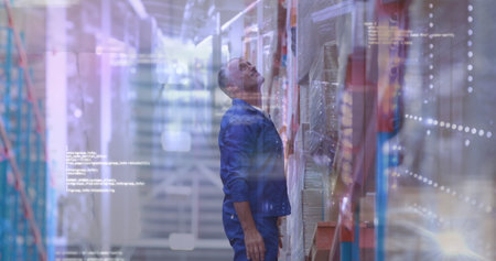 Image of data processing over caucasian worker in warehouse. Global business and digital interface concept digitally generated image.の写真素材