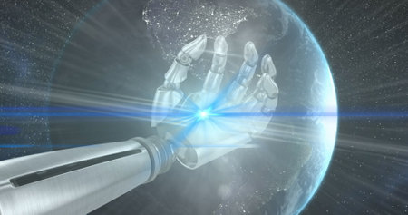 Image of light trails over robotic hand and globe on black background. Global technology, computing and digital interface concept digitally generated image.の写真素材
