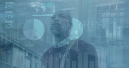 Image of data processing over african american businessman. global business and digital interface concept digitally generated image.の写真素材