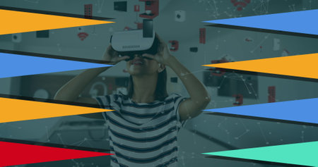 Image of geometrical shapes over biracial woman using vr headset. Global science, connections, data...