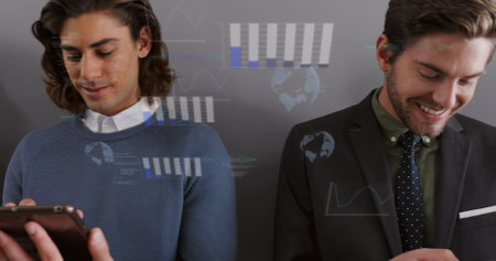 Image of financial data processing over  man using smartphone. Global connections, business, finances, computing and data processing concept digitally generated image.の写真素材