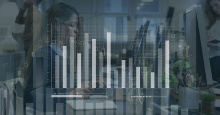 Image of statistical data processing over biracial woman using computer at office. Computer interface and business data technology conceptの写真素材