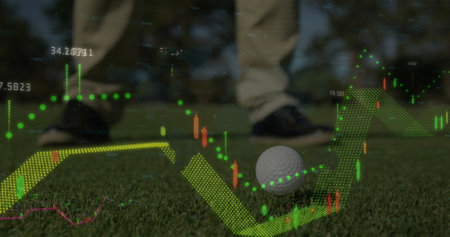 Image of graphs with numbers over low section of caucasian man hitting golf ball with club. Digital composite, grass, golf course, leg, shoe, green, sport, hobby and competition concept.の写真素材