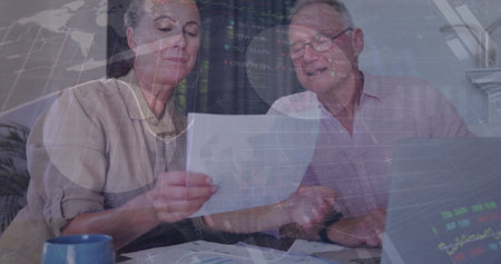 Image of infographic interface over caucasian colleagues discussing reports in office. Digital composite, business, report, finance, teamwork, office, document and technology concept.の写真素材