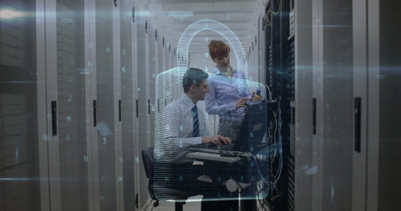 Image of data processing over computer servers and caucasian male and female it engineer. global internet security, data processing and digital interface concept digitally generated image.の写真素材