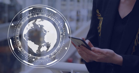 Image of globe and data processing over caucasian woman using smartphone. Global artificial intelligence, connections, computing and data processing concept digitally generated image.の写真素材