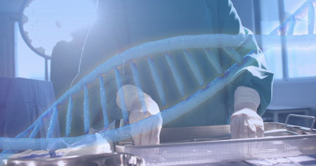 Image of dna strand over diverse surgeons in hospital. Global medicine, science, data processing and digital interface concept digitally generated image.の写真素材