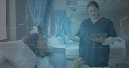 Image of scientific data over diverse female doctor and patient in hospital. Global medicine, science, data processing and digital interface concept digitally generated image.の写真素材