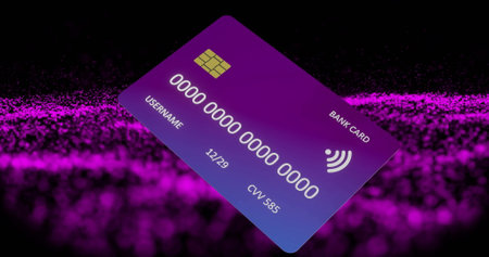 Image of credit card over purple spots on black background. Finances, business, computing and digital interface concept digitally generated image.の写真素材