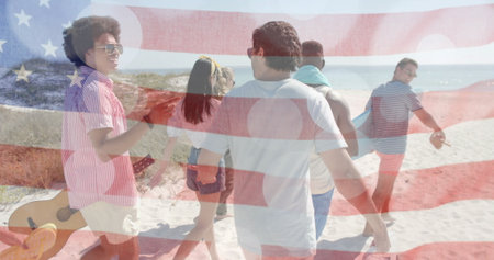 Image of flag of usa over happy diverse friends on beach in summer. American patriotism, diversity and vacation concept digitally generated image.の写真素材