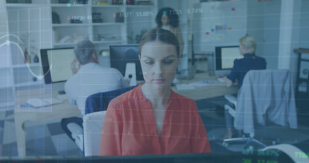 Image of multiple graphs and trading board over caucasian woman working on computer in office....