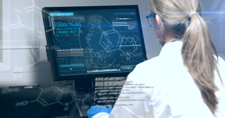 Image of data processing over caucasian senior female scientist using computer at laboratory. Medical research and science technology conceptの写真素材