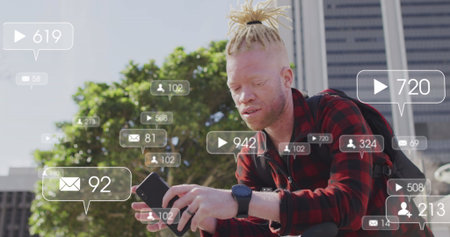 Image of social media data processing over albino man using smartphone in city. Global computing,...