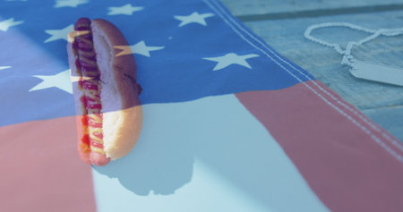 Image of usa flag over hot dogs. american culture, tradition and patriotism concept digitally generated image.の写真素材