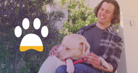 Image of paw icon over happy caucasian man with dog. National dog day and digital interface concept...