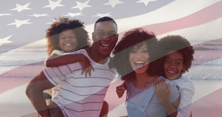 Image of flag of usa over african american couple with son and daughter on vacation. American patriotism, nationality, summer and diversity concept digitally generated image.の写真素材