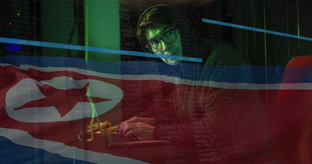 Image of binary coding with hacker over flag of north korea. Global business, finance, data...
